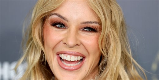 Kylie Minogue debuts choppy boho fringe at London's 2025 Fashion Awards