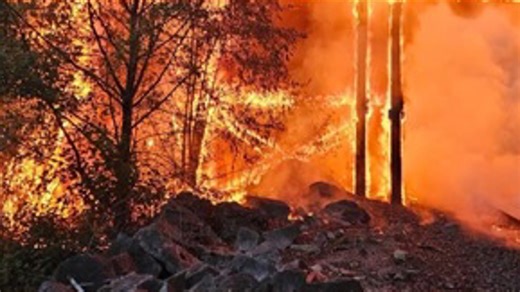 One person burned in massive fire on railroad tracks in Snohomish