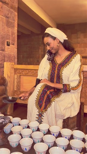Hasset Dereje on Instagram: "Brewing coffee the way it all started 🤍☕️ Ethiopia, origin of the coffee ceremony. Lalibela moments. @liya_t_tsegaye @liya_fetil thank you for this beautiful dress yene konjo🤍 @yesakorr and @jc.nati 📸 you guys are the best🫶🏽 #coffee #missworld #explorepage✨ #lalibela"