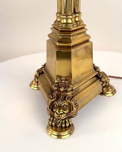 A Regency brass triple column table lamp