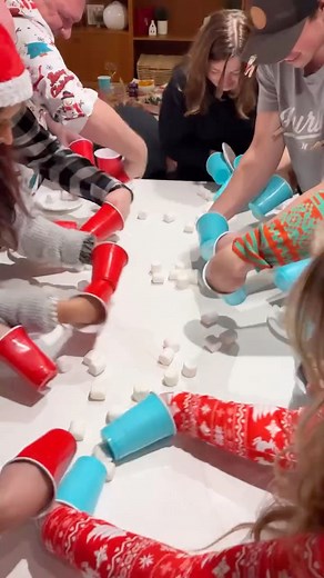 SAVE THIS post - these 10 minute to win it Christmas games were a huge hit at our annual Elf party! Comment “elf” and I’ll send you more party ideas or find them here https://homemadeheather.com/elf-holiday-party-ideas/ THE GAMES: Icebreaker - each person gets three clothes pins. If you hear someone say the “forbidden word” you get to steal their pin. Most pins wins - word was “christmas”. GAME ONE - stack solo cups with chopsticks (relay) Chop sticks (4) Solo cups (20) Fastest team wins. GAME T