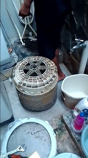 First stage of disassembly: cleaning the drum of a front-load washing machine