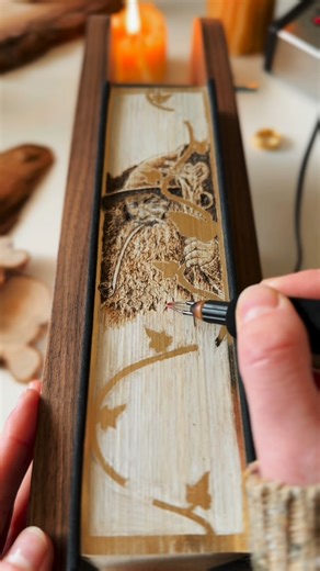 Art Daily Dose on Instagram: "Court O’Reilly is a Canadian pyrography artist celebrated for her bold and intricate wood-burning artworks, often inspired by wildlife and natural scenes. Her signature pieces extend beyond wood panels—she even transforms book edges into striking art forms. Her process combines a deep respect for nature with an uncanny precision in execution. Each piece is built layer by layer, where the burn marks become both texture and storytelling, creating rich scenes that feel