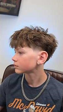 Messi textured fringe with low taper fade! #barber #haircutting #seattlebarber #stocktonbarber