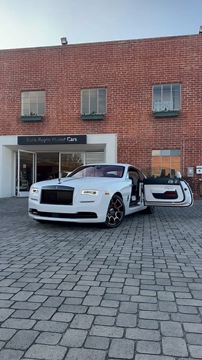 @RollsRoyceCarsBeverlyHills is proud to have this gorgeous 2021 Black Badge Rolls-Royce Wraith in Artic White available in our showroom. Powered by a 6.6L V12 DGI DOHC 48V Twin Turbocharged engine and paired with an 8-speed automatic transmission, Wraith delivers a sophisticated yet powerful driving experience. Distinguished by its Dark Chrome Spirit of Ecstasy and 21” Carbon Alloy Composite Wheels and equipped with Black Badge Treadplates, Front Ventilated Seats, and Black Badge Technical Fibre