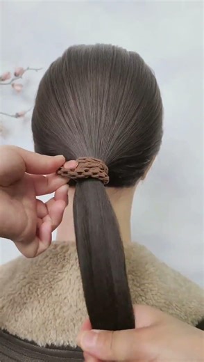 The Secret to a Flawless Low Bun: Quick & Easy Tutorial