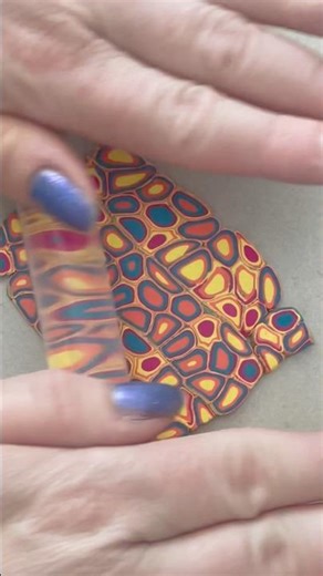 A fun little pattern created with an extruder and polymer clay