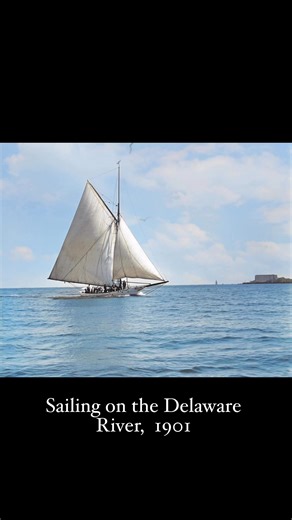 A glimpse of life on the water more than a century ago. This elegant sailboat skims across the Delaware River, its massive canvas catching the wind while passengers lean into the moment. #DelawareRiver #SailingHistory #VintageBoating #1900sLife #HistoricPhotography #Restore | Memory Lane Photos