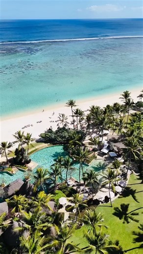 La Pirogue Mauritius on Instagram: "Soar above the iconic La Pirogue and take in the breathtaking beauty of its thatched-roof bungalows, lush palm gardens, and pristine white-sand beach, all framed by the turquoise waters of the Indian Ocean. This is where timeless charm meets island magic. 📷: @rochita_arc #LaPirogueMauritius #IslandEscape #AerialView #TropicalParadise #DroneMagic #BeachVibes"
