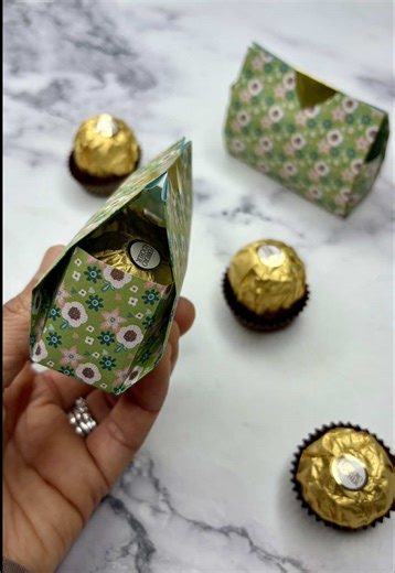 Replying to @Jamie Capili You asked and here it is! I don’t know about you, but I LOVE Ferrero Rocher chocolates! What if you want to gift 2 to someone special? This would be the perfect way to present them! Grab a 15 x 15 cm square of origami, printer or wrapping paper and let’s get started! You’ll also need a ruler with a width of 2.5cm. Save this video for later and follow me for more content! #teachergifts #thankyougift #teachersday #ferrerorocher #chocolategift