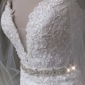 Sparkle and lace!... amazing detailing on our Natalie dress... showstopping! 🤩. . . . . #lacedress #laceweddingdress #lacebridal #lacebridalgown #weddingdress #plungedress #lownecklinebridal #fishtailwedding #fishtailweddingdress #abroadwedding #2019wedding #2020wedding #designerbridal #designerweddingdress | Lula Ann Bridal