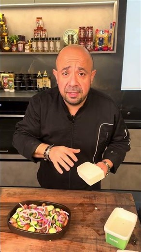Chef Mario is preparing a traditional Greek Salad;