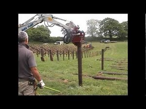 Mini-Postmaster installing solar panel installation posts with Solar South West