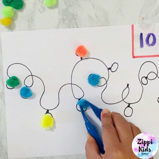"Counting lights" Math center fine motor activity for preschool and kindergarteners!! 🎄🎄🎄 This Christmas Lights counting math activity is super easy to set up...All you need is a marker, Adhesive tape,pom poms, tweezers and go! 🎄🎄🎄 | Zippi Kids Corner