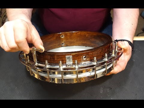 Assemble the banjo pot and install and adjust a new banjo head!