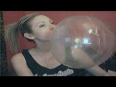 Blowing a giant bubble gum bubble in a popped bubble