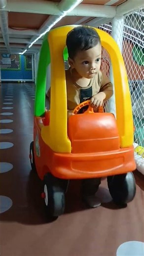 If you like to ride a green, yellow, and orange mini car #trendingshorts #trending