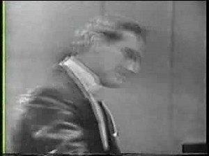 Liberace in 1957 playing Piano Roll Blues & Strauss