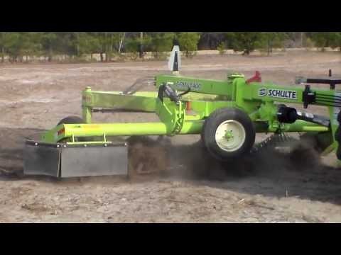 Easy way to pickup roots, stumps and chunks with a Schulte SRW1400 Windrower & RS320 Rock Picker