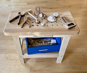 Toy Workbench With Lots of Wooden Tools