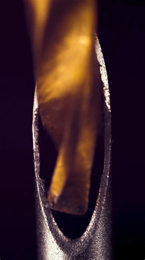 Syringe needle drilling in extreme close up detail