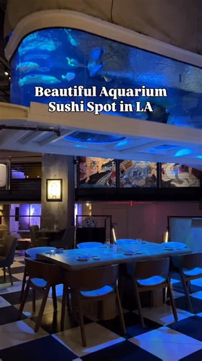 OC Food | Christine☀️ on Instagram: "Unique Saltwater Aquarium Dining Experience 🐠 @mrsfishla a massive & beautiful 5,500 gallon suspended saltwater fish tank with tropical fish! Enjoy the view while you’re eating your food! The sushi here is fresh and delicious, but the standout is the unique dining room! 🐟 📍448 S Hill St Los Angeles, CA 90013 #sushi #unique #aquarium #japanesefood #gem"