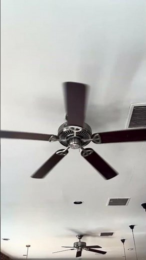 Hampton Bay Farmington ceiling fan running on medium with the chain and medium with a remote