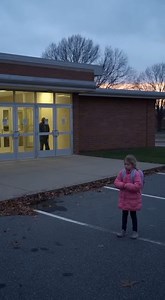 "I Watched Her Wait for 14 Days Straight. When I Finally Asked Who Was Coming, Her Answer Broke Me. Chapter 1 The first time I saw her, I thought she was just a slow packer. You know the type—the kid who loses a mitten, or forgets their lunchbox, or just dawdles by the cubbies until the last bus is revving its engine. But then the buses left. And the cars left. And the silence of the suburbs settled over Lincoln Elementary like a heavy wool blanket. And she was still there. Her name was Lily. I 