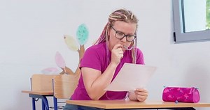 Woman Student Reads Tasks Paper Test Stock Footage Video (100% Royalty-free) 1100858553 | Shutterstock