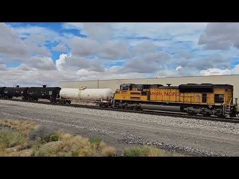 Union Pacific 1988 The Katy leading the eastbound MWCSA monster manifest train with a mid-train DPU