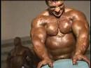 Bodybuilder Paco Bautista pumping backstage