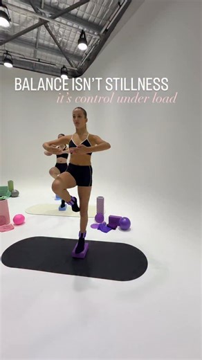 Dance Fit Co on Instagram: "This isn’t just a balance exercise — it’s neuromuscular control in action. Standing on a split block instantly removes stability, forcing your body to organise itself through the ankle, knee, and hip. When you add resistance (ankle training weights), every movement becomes a dialogue between strength and precision. 💡 Key focus points: • Keep your supporting knee tracking over the second toe — that’s your alignment cue. • Don’t let the working hip hike as you extend —