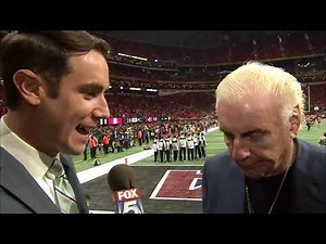 Ric Flair give the Bulldogs a pep talk