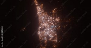 Perth (Australia) aerial view at night. Top view on modern city with street lights. Camera is flying above the city, moving backward