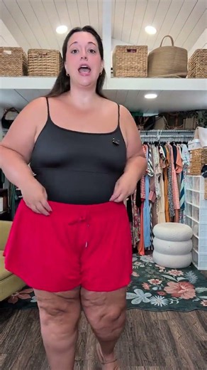 Plus size athletic shorts with built-in coverage and a pocket