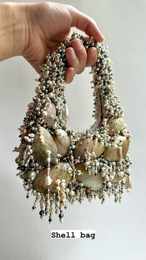 Atelier Paula Votteler on Instagram: "I made a bag out of abalone shells👂🐚 For as long as I can remember, I’ve been looking for abalones whenever I’m on a beach. They are my mom’s favorite seashells and I spent so many wonderful hours with her searching for them. I’m very happy that I was finally able to use them in a project. #embroidery #embroideryart #embroidered #embroidering #sew #sewing #seashells #shells #abalone #diy #doityourself #beads #pearls #motherofpearl"