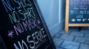 Nashville sees spike in COVID cases, prompting some businesses to reimplement protocols