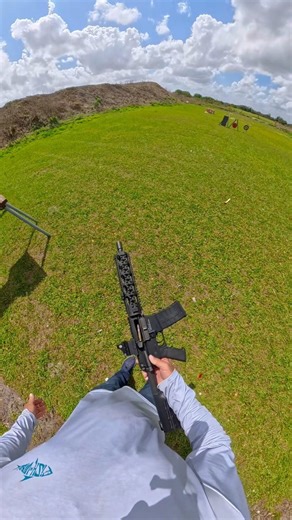 SHOOTING MY AR 15 BEHIND MY BACK AFTER I KICK A BULLET OFF MY FOOT INTO THE CHAMBER WATCH ￼ 🔥