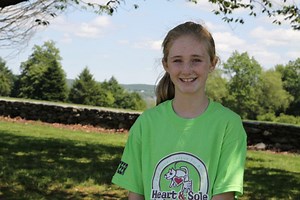 Rescued Pug Helps Teach Children, Family Benefits of Volunteering