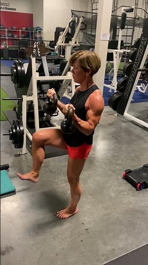 The MOST Muscular ALL-Natural Female Figure Athlete Ever on Single Leg Bicep Curl with Kettlebells