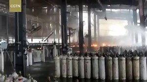 A fire at a gas company's acetylene cylinder filling facility was put out and massive gas blasts narrowly avoided in Wuxi City of east China's Jiangsu Province on Monday. The fire broke out at around 9:30 a.m., and video footage shows that some workers were working at the site when cylinders began to explode. | CGTN