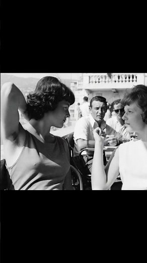 French Classic Women with Armpit Hair Talk Cinema on a 1960s Côte d’Azur Balcony