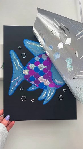 Jessica 🍋 on Instagram: "May I present… the rainbow fish! Let me know what yall think of this one, do you remember the book? Do you remember the plot? Because I sure don’t, I was too busy looking at the shiny foil! 😊 but actually if you remember the plot pls lmk… #foilart #processvideo #foil #handmade #processart #oddlysatisfying #maker #nostalgia"