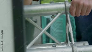 Event portable adjustable aluminium stage system installation Slow motion detail