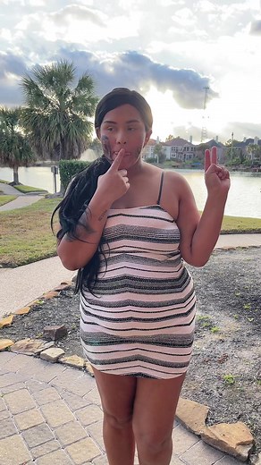 Outdoor Fashion in Striped Dress at Sunset