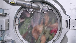 4k Video of industrial washing machine is washing a big amount of textiles
