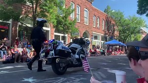 Happy Fourth of July Flagstaff! Stay safe, drink responsibly and enjoy the day! Officer Williams enjoying the parade! Thanks to @Amber Yubeta for the great video. | Flagstaff Police Department