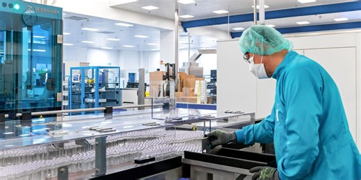 To Make More Covid-19 Vaccines, Rival Drugmakers Team Up