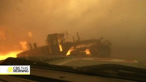 "He needs to get out!" WATCH: A man jumps out of a burning tractor just before it's engulfed in flames http://cbsn.ws/1ScnE3P | CBS Mornings