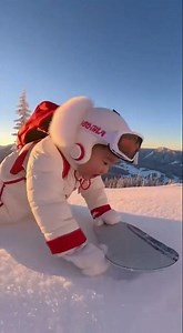 Asian Baby's First Snowboard Adventure Tiny Explorer in Snow